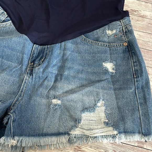 Pinkblush Medium Wash Distressed Fringe Hem
Maternity Full Panel Jean Shorts - Picture 6 of 11